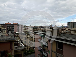 An amazing caption of the sunset over the city of genova in summer