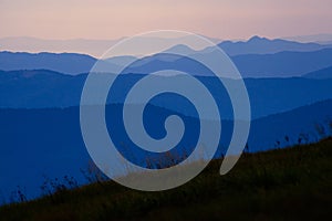 Amazing Carpathian mountains evening layers view near Dragobrat photo