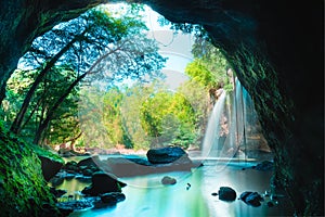 Amazing cave in deep forest with beautiful waterfalls background at Haew Suwat Waterfall in Khao Yai National Park