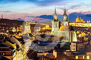 Amazing cityscape view of Prague Castle and church of our Lady Tyn, Czech Republic during sunset time. View from powder tower. Wor