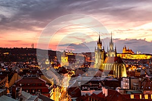 Amazing cityscape view of Prague Castle and church of our Lady Tyn, Czech Republic during sunset time. View from powder tower.