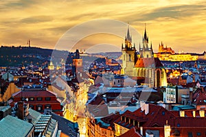 Amazing cityscape view of Prague Castle and church of our Lady Tyn, Czech Republic during sunset time. View from powder tower.