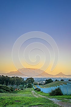 Amazing clear sky View of Table Mountain and Cape Town City at sunrise on a beautiful morning, Cape Town