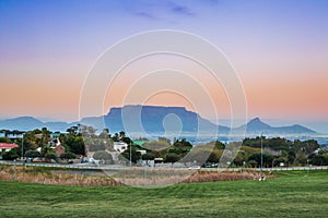 Amazing clear sky View of Table Mountain and Cape Town City at sunrise on a beautiful morning, Cape Town