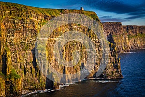 Amazing Cliffs of Moher at sunset in Ireland, County Clare