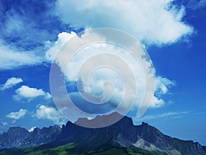 The amazing clouds over the Alps mountain range in the Canton of St. Gallen region