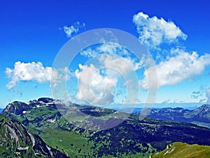 The amazing clouds over the Alps mountain range over the river Rhein valley and Alviergruppe region