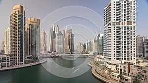 Amazing colorful dubai marina skyline during sunset timelapse