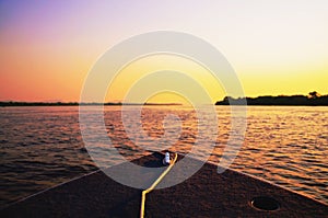 Amazing colorful landscape at sunset of a boat navigating on Pan