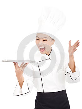 Amazing cook woman chef holding tray