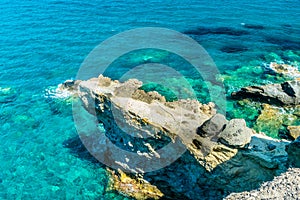 Amazing crystal clear water down the cliffs of Papafragas, Milos Island,  Greece