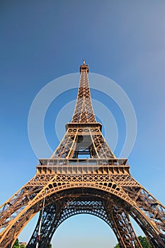 The amazing Eiffel Tower in Paris. Tower is one of the most recognizable landmarks in the world. Famous touristic pl