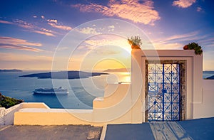 Amazing evening view of Fira, caldera, volcano of Santorini, Greece. photo