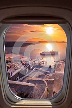 Amazing evening view of Fira, caldera, volcano of Santorini, Greece with cruise ships at sunset.