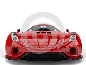 Amazing fiery red super car - front view closeup shot