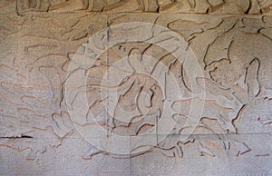 Amazing fishes bas-relief or stone carving on the wall of Angkor Wat Temple, Siem Reap, Cambodia