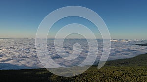 Amazing flight over the clouds in Teide national Park, Tenerife, Canary Islands, Spain.Sunset above the clouds