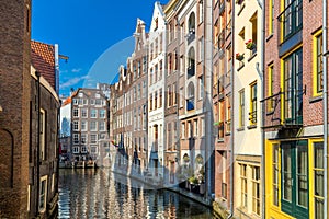 Amazing floating houses of Amsterdam. Old houses are built in the water. A popular place in Amsterdam. Holland, Netherlands, Europ