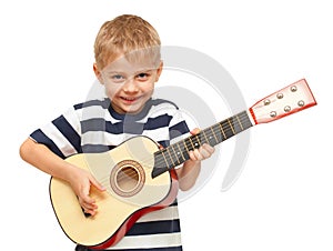 Amazing four year old boy playing guitar