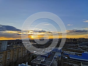 Amazing golden sunset, rare clouds on horizon, Krasnogorsk, Moscow, Russia