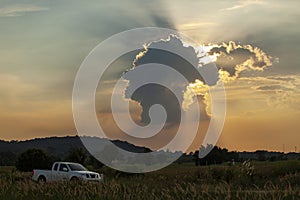 amazing human head shape cloud and sun light ray in saraburi thailand