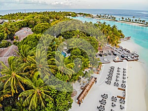 Amazing island in the Maldives ,Beautiful turquoise waters and white sandy beach with blue sky background for holiday vacation