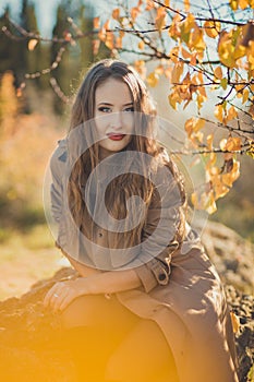 amazing lady girl nifty stylish dressed in autumn jacket with blond hairs and pout red lips with make up face posing sit for