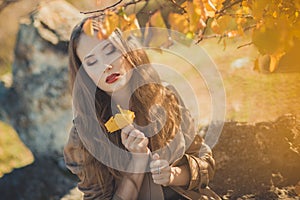 amazing lady girl nifty stylish dressed in autumn jacket with blond hairs and pout red lips with make up face posing sit for