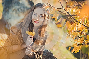 amazing lady girl nifty stylish dressed in autumn jacket with blond hairs and pout red lips with make up face posing sit for