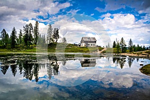 Amazing Lago Di Federa See with beautiful reflection. Majestic Landscape with Dolomites peak, Cortina D`Ampezzo, South Tyrol, photo