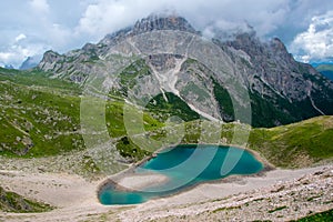 Amazing lake with azure water in Dolomite Alps