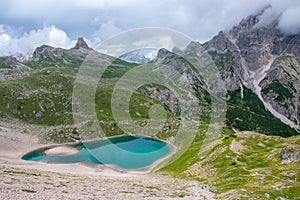 Amazing lake with azure water in Dolomite Alps