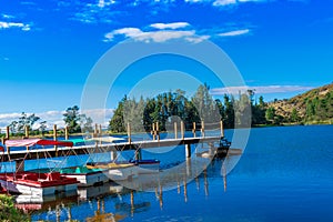 Amazing Lake Busa with a dock and boats in GirÃ³n, Ecuador