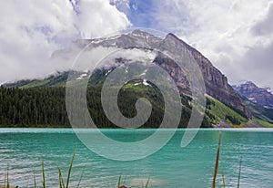 Amazing Lake Louise in Banff National Park, Alberta, Canada. Cloudy day after rain