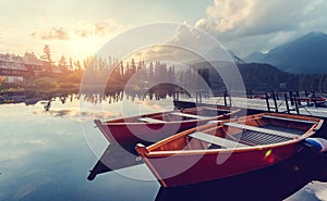 Amazing lake Strbske Pleso during Sunrise. Creative image. Wonderful Autumn landscape. Picturesque view of nature. Amazing natural