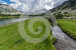 Amazing Landscape of Banderishki Chukar Peak and reflection in Muratovo lake, Pirin Mountain