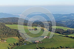 Amazing landscape of the Black Forest in the morning with fog during sunrise, seen from a hot-air ballon, Hinterzarten