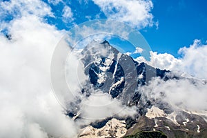 Amazing landscape of rocky mountains and blue sky, Caucasus, Russia