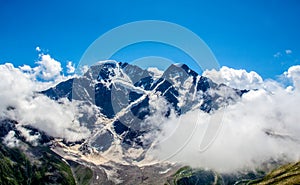 Amazing landscape of rocky mountains and blue sky, Caucasus, Russia