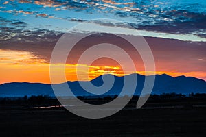 Clouds at the sunset photo