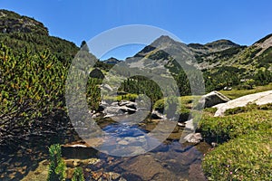 Amazing landscape with Valyavitsa river and Valyavishki chukar peak, Pirin Mountain