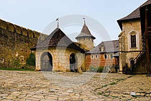 Amazing landscape view of courtyard with ancient stone buildings in the medieval castle