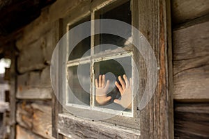 Amazing little wooden small house next to a waterfall on the dock of Hellesylt, child playing in the house