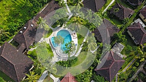 Amazing Luxury resort in Indonesia. Drone View of large villa with massive beautiful pool tucked within lush greenery and perched