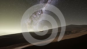 Amazing milky way over the dunes Erg Chebbi in the Sahara desert