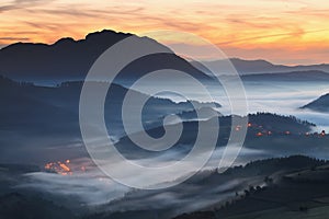 Amazing misty sunrise over Aramaio Valley