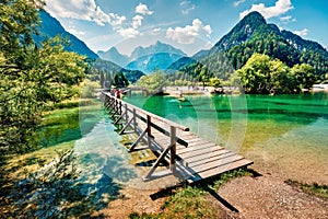 Amazing morning view of Jasna lake. Attractive summer scene of Julian Alps, Gozd Martuljek location, Slovenia, Europe. Wonderful