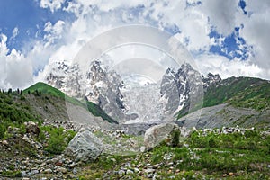 Amazing mountain Caucasus landscape of peaks of mountains Tetnuldi, Gistola and Dzhangi-Tau and glacier Lardaad in Svaneti Georgia