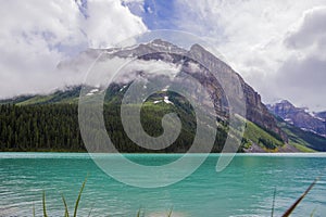 Amazing mountain landscape - Lake Louise, Rocky Mountains. Banff Tourism, National Park, Alberta, Canada.