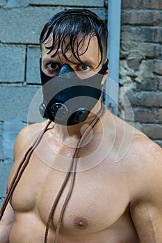 Amazing muscular man with black mask